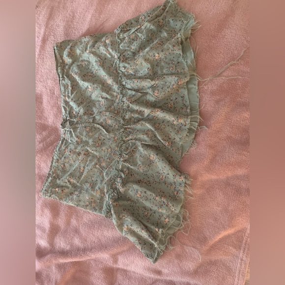 Brandy Melville skirt with tie in front sage green with flowers and purpose rips - Picture 2 of 4